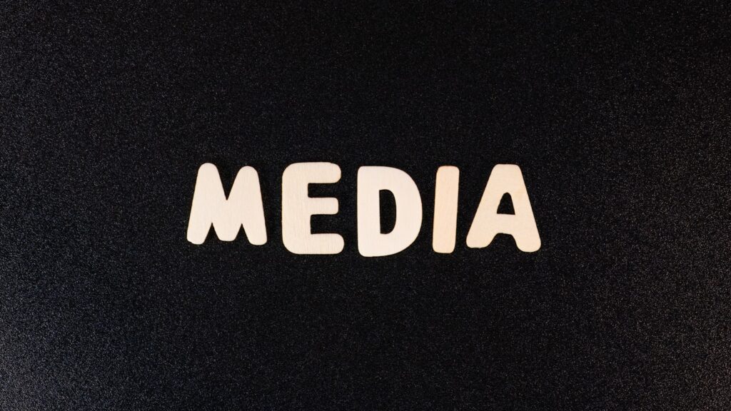 the word media spelled with white letters on a black background